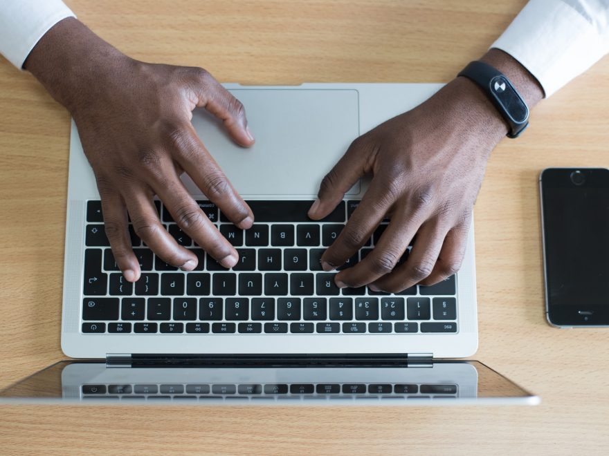 Hands On a Laptop. Photo by Cytonn Photography on Unsplash