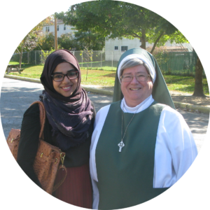 Muslim woman with Christian woman.