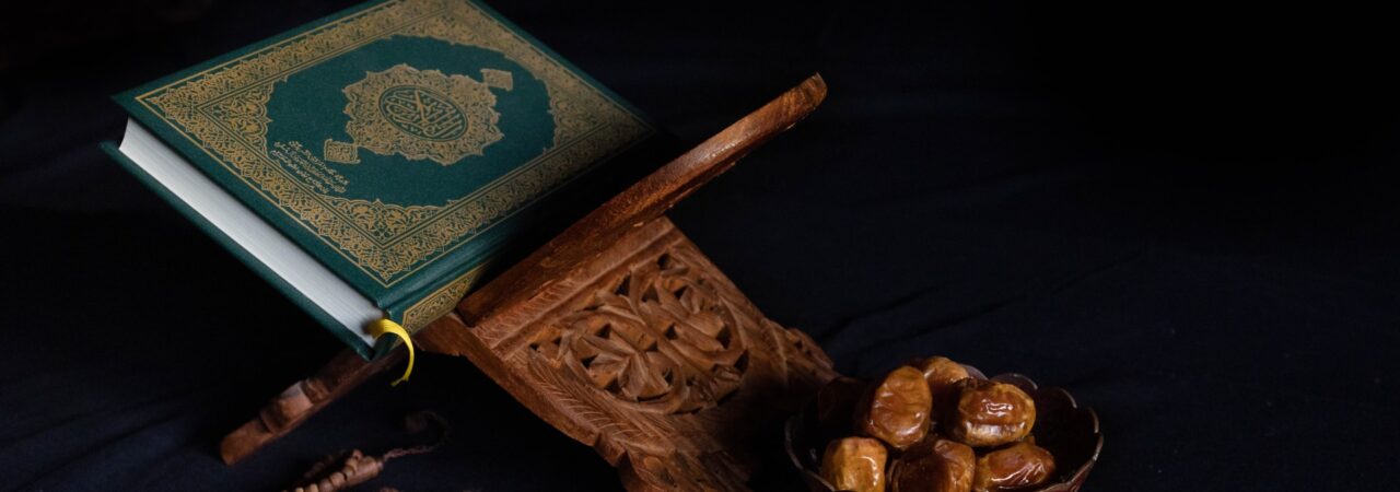 Quran and Dates by Abdullah Arif on Unsplash