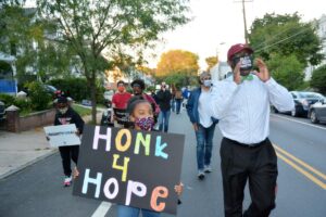 The Rev. James Buck, senior pastor of Grace Baptist Church of Germantown, leads a social justice march down Germantown Avenue last in October 2020. — TRIBUNE FILE PHOTO